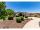 Beautiful single-story home featuring decorative gravel, landscaping, and stone accents at 2129 E Beautiful Ln, Phoenix, AZ 85042
