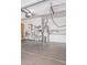 Spacious garage with built in cabinets, storage, and room for vehicles and projects at 2129 E Beautiful Ln, Phoenix, AZ 85042