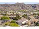 Scenic neighborhood nestled against a mountain backdrop, showcasing the community's serene environment at 2129 E Beautiful Ln, Phoenix, AZ 85042