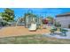 Community playground with slides, a picnic table, and green grass creating a fun place for children to play at 2129 E Beautiful Ln, Phoenix, AZ 85042