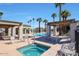 Community pool and jacuzzi, showcasing a spa with covered pergolas and comfortable lounge furniture at 2129 E Beautiful Ln, Phoenix, AZ 85042