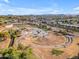 Aerial view showcasing the community park and recreation area featuring a splash pad, skate park, and walking trails at 2234 N 74Th Way, Scottsdale, AZ 85257