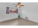 Bedroom featuring light colored laminate flooring and a ceiling fan at 2234 N 74Th Way, Scottsdale, AZ 85257