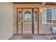 Inviting front door with decorative glass and charming details at 2234 N 74Th Way, Scottsdale, AZ 85257