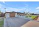 Charming home featuring a long driveway and a white picket fence at 2234 N 74Th Way, Scottsdale, AZ 85257