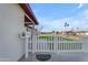 Charming front yard featuring a white picket fence and well manicured greenery at 2234 N 74Th Way, Scottsdale, AZ 85257