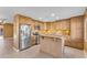 Well-equipped kitchen with stainless steel appliances, granite countertops, and ample cabinet space at 2234 N 74Th Way, Scottsdale, AZ 85257