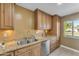 Kitchen with granite countertops, stainless steel appliances, and updated cabinetry at 2234 N 74Th Way, Scottsdale, AZ 85257