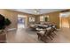 Inviting living room features a ceiling fan, neutral tones, stylish decor and an exterior view at 2234 N 74Th Way, Scottsdale, AZ 85257