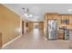 Bright and airy living room with stainless refrigerator and hardwood flooring at 2234 N 74Th Way, Scottsdale, AZ 85257