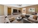 Inviting living room features comfortable seating, ceiling fan, and neutral tones with an exterior view at 2234 N 74Th Way, Scottsdale, AZ 85257