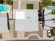 An aerial view of a home with a bright, white roof, pool, and green artificial turf in the backyard at 2706 W Isabella Ave, Mesa, AZ 85202