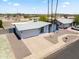 Charming home boasts a two-car garage, tidy landscaping, with an expansive, well-maintained driveway at 2706 W Isabella Ave, Mesa, AZ 85202