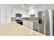 Modern kitchen featuring stainless steel appliances and granite countertops, perfect for culinary enthusiasts at 2706 W Isabella Ave, Mesa, AZ 85202