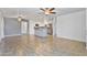 Bright and spacious living area featuring an open layout with a kitchen view at 2706 W Isabella Ave, Mesa, AZ 85202