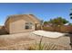 Backyard featuring desert landscaping, a patio, and privacy wall at 2861 E Morenci Rd, San Tan Valley, AZ 85143