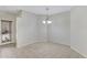 Bright dining area with tiled floors and a stylish light fixture at 2861 E Morenci Rd, San Tan Valley, AZ 85143