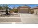 Charming single-story home with a two-car garage and landscaped front yard at 2861 E Morenci Rd, San Tan Valley, AZ 85143