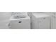 Functional laundry room with a modern front-load washer and dryer set at 2861 E Morenci Rd, San Tan Valley, AZ 85143