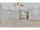 Open-concept living space with tile floors connects the dining and kitchen areas at 2861 E Morenci Rd, San Tan Valley, AZ 85143