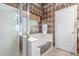 Bathroom featuring shower, bathtub, and diamond patterned wall design at 29049 N Coal Ave, San Tan Valley, AZ 85143