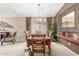 Inviting dining room featuring a chandelier, large window, and elegant decor for a cozy atmosphere at 29049 N Coal Ave, San Tan Valley, AZ 85143