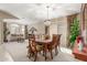Elegant dining room with a large wooden table, stylish chairs, and decorative accents at 29049 N Coal Ave, San Tan Valley, AZ 85143