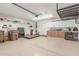 Spacious garage with ample storage cabinets and work area at 29049 N Coal Ave, San Tan Valley, AZ 85143