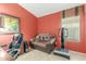 The in-home office features a comfortable couch and neutral-colored flooring at 29049 N Coal Ave, San Tan Valley, AZ 85143
