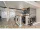 Open concept area featuring a bar with seating and a beautifully decorated living room at 3061 W Betty Elyse Ln, Phoenix, AZ 85053
