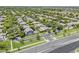 Wide aerial perspective showing residential neighborhood, street, and green spaces of the community at 3062 E Cullumber St, Gilbert, AZ 85234