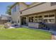 Inviting backyard with built-in grill and hot tub provides perfect space for outdoor relaxation and entertaining at 3062 E Cullumber St, Gilbert, AZ 85234