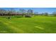 Picturesque park features lush green space, mature trees, and covered picnic area for community enjoyment at 3062 E Cullumber St, Gilbert, AZ 85234