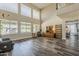 Bright, open-concept living room with large windows and views of the landscaped backyard at 3062 E Cullumber St, Gilbert, AZ 85234
