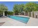 A stunning backyard pool with refreshing blue water surrounded by a concrete patio, ideal for relaxing at 3062 E Cullumber St, Gilbert, AZ 85234