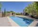A private backyard features a swimming pool and lounging area, perfect for outdoor entertaining at 3062 E Cullumber St, Gilbert, AZ 85234