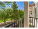 Balcony view with a mature saguaro cactus and trees at 3150 E Beardsley Rd # 1081, Phoenix, AZ 85050