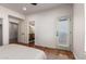 Cozy bedroom offers a door to the outside and an ensuite bathroom at 3150 E Beardsley Rd # 1081, Phoenix, AZ 85050