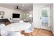 Open-concept dining area with modern table and chairs, and view to bright living space at 3150 E Beardsley Rd # 1081, Phoenix, AZ 85050