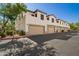 Exterior view of condos and attached garages at 3150 E Beardsley Rd # 1081, Phoenix, AZ 85050