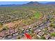 Scenic aerial view of a Primary-planned community, highlighting the golf course and mountain views at 32710 N 71St St, Scottsdale, AZ 85266
