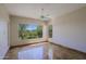 Bedroom with large window and views to desert landscaping at 32710 N 71St St, Scottsdale, AZ 85266