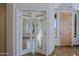 Light filled entryway with glass paneled doors and desert views at 32710 N 71St St, Scottsdale, AZ 85266