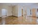 Open-concept living area boasts marble floors, a chandelier, and inviting access to other parts of the home at 32710 N 71St St, Scottsdale, AZ 85266