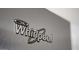 Close-up of a stainless steel Whirlpool refrigerator, showcasing its sleek design at 3314 E Draper Cir, Mesa, AZ 85213