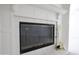 Elegant fireplace featuring glass doors and classic design details at 3314 E Draper Cir, Mesa, AZ 85213