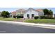 Well-manicured lawn enhances the curb appeal of this delightful single-story home at 3314 E Draper Cir, Mesa, AZ 85213