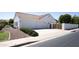 Attached two-car garage offering ample parking and storage space at 3314 E Draper Cir, Mesa, AZ 85213