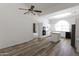Open-concept kitchen with modern appliances and seamless flooring at 3314 E Draper Cir, Mesa, AZ 85213