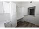 Functional mud room with built-in desk and ample cabinet space at 3314 E Draper Cir, Mesa, AZ 85213